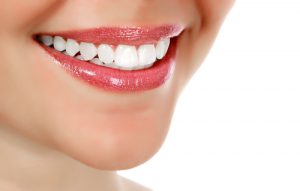 'woman with healthy teeth smiling'